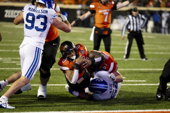 Ollie Gordon II's 5 TDs lead Oklahoma State past BYU in 2OT, into Big 12 title game